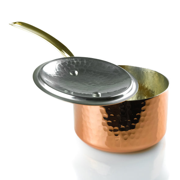 The hand hammered copper saucepan is ideal for cooking 